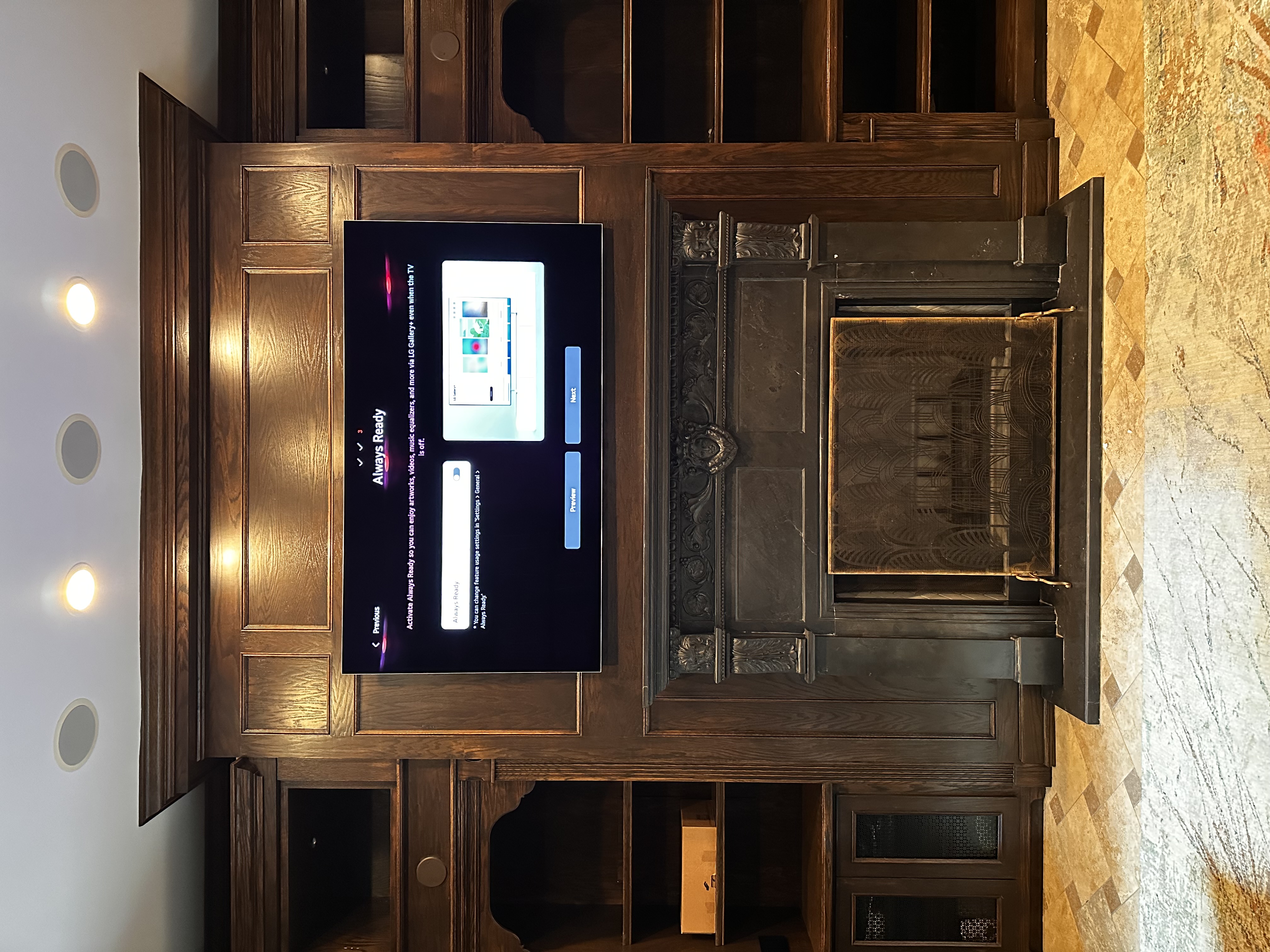 TV mounting with soundbar and clean cable setup